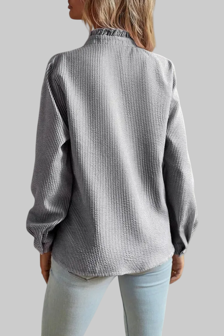 BLUSA ELEGANTE CON VOLANTES