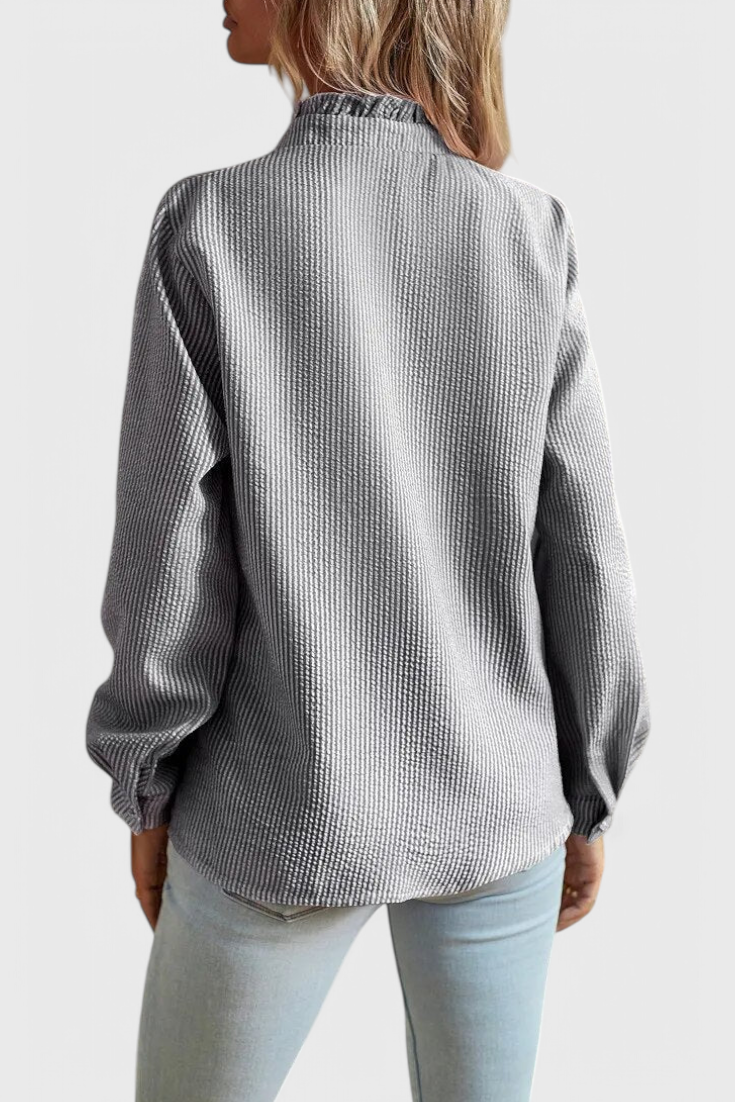 BLUSA ELEGANTE CON VOLANTES
