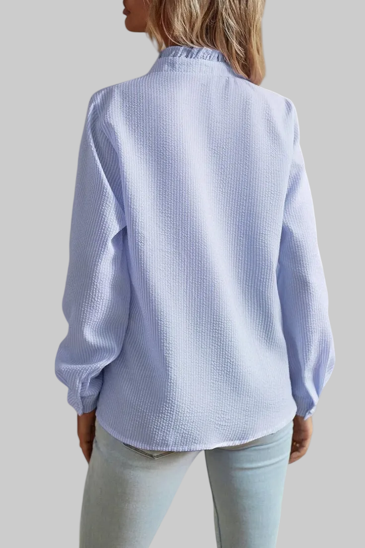 BLUSA ELEGANTE CON VOLANTES