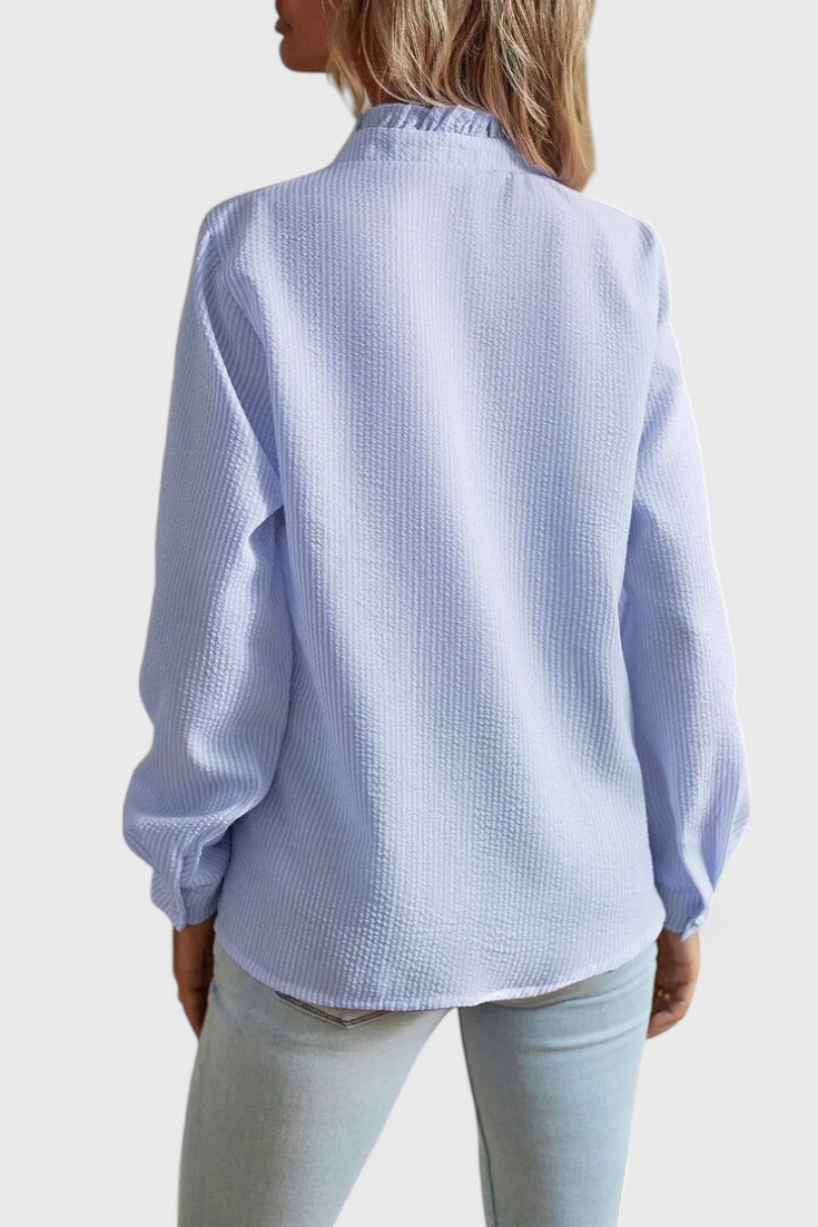 BLUSA ELEGANTE CON VOLANTES